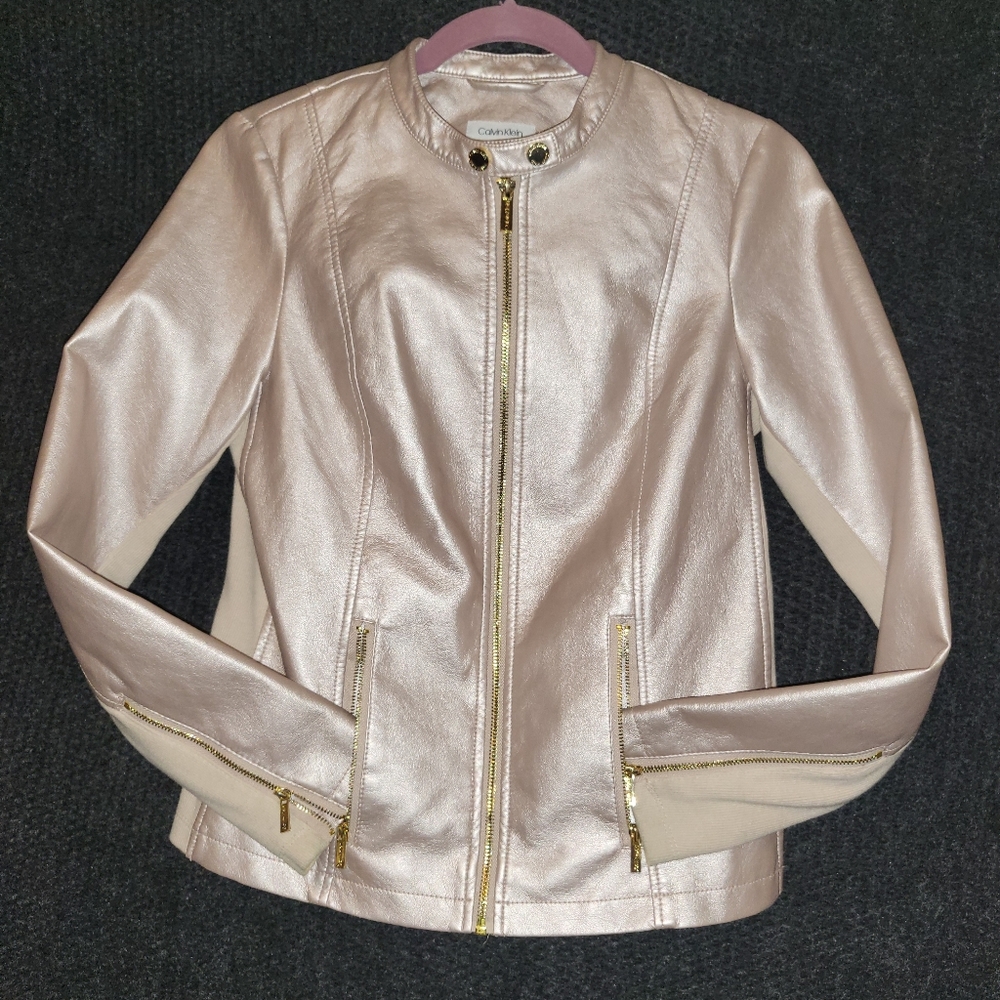 Pink metallic Calvin Klein jacket. In excellent condition..worn 2 times